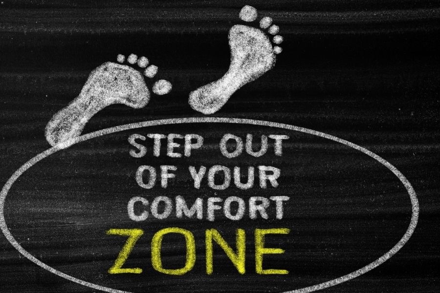 two feet are coming out of the comfort zone