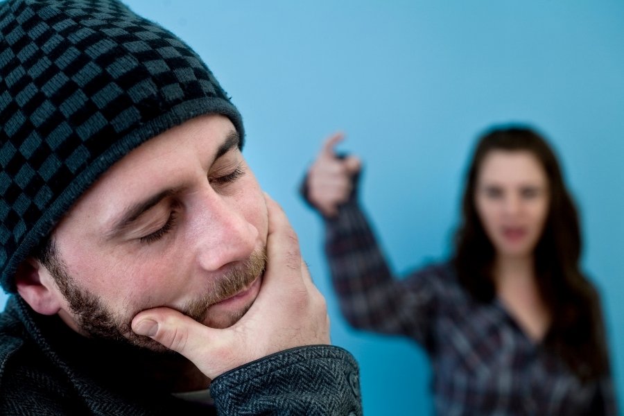 woman is yelled at stressed man