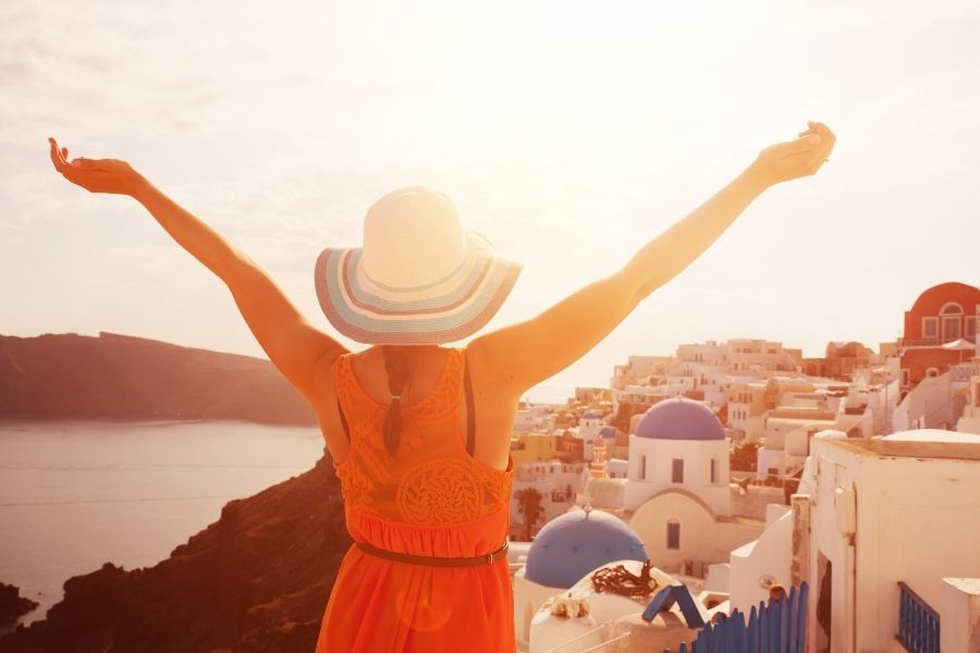 Happy woman in the top of city