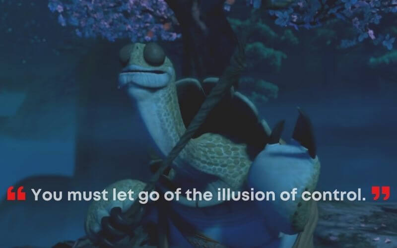 Master Oogway holds a cane in his hand