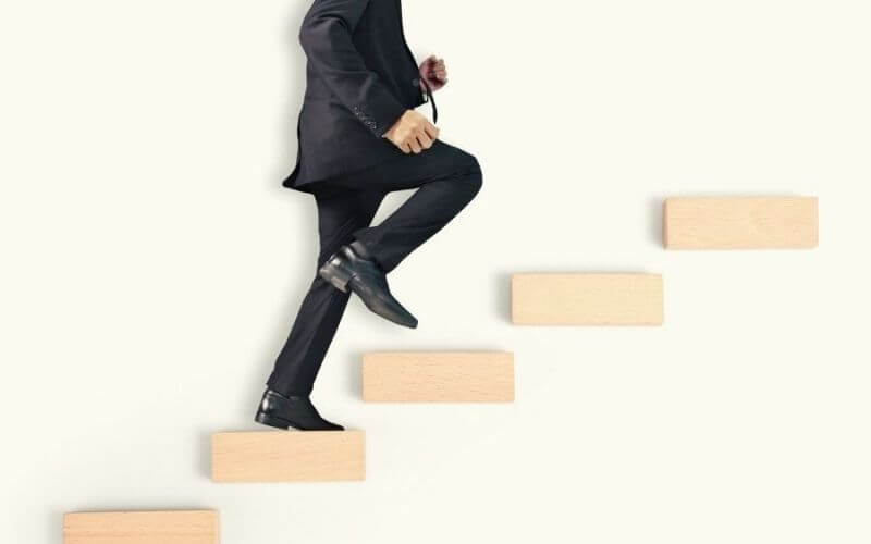 The man who quickly climbs the wooden stairs