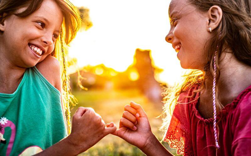 Two beautiful girls make peace after talking