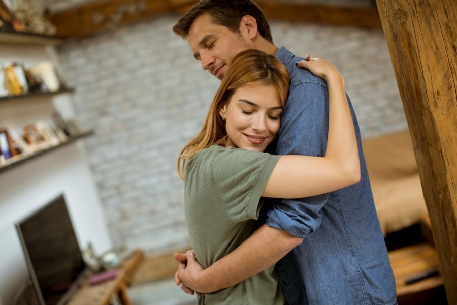 A boy and girl hugging each other for The Hug Shifting Method