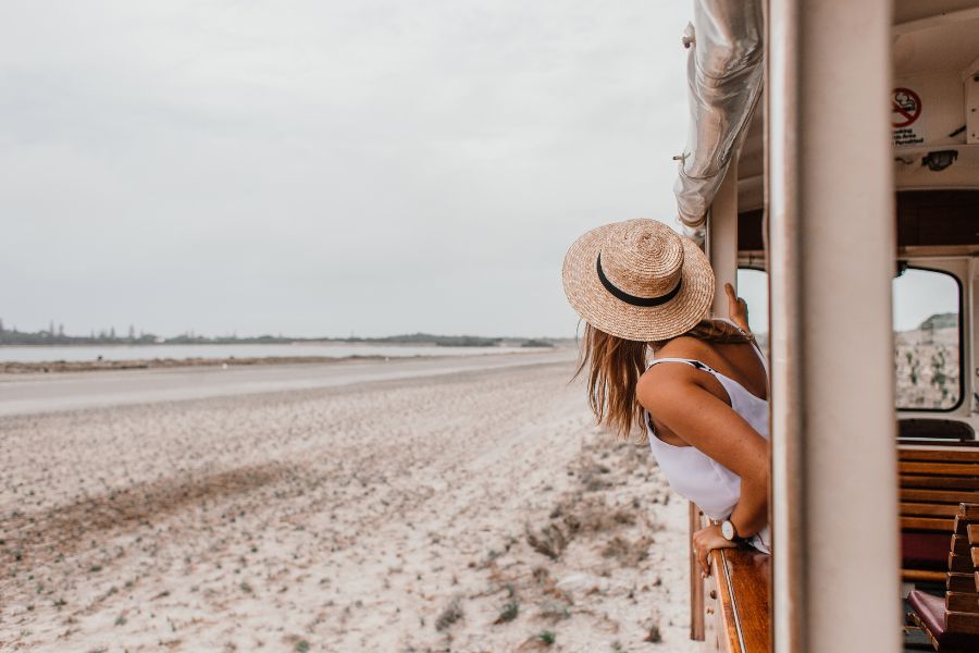 A lady in a train doing the train shifting method