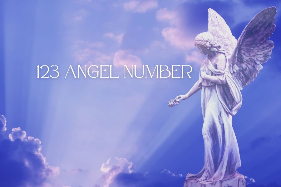 123 angel number in the sky with a statue