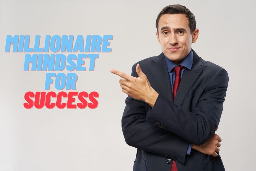 A businessman pointing at Millionaire mindset for success